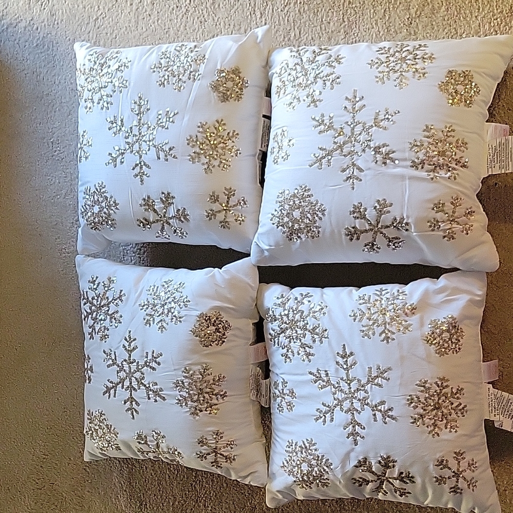 A Set of 4 North Pole Trading Co. Holiday Snowflake Square Throw Pillow